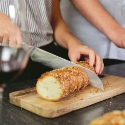 Alpha-Royal Japanese Serie 8" Brotmesser 18° Wellenschliff Damaszener-Stahl -Outdoor Grills Verkaufsgeschäft 10038985 de 0003 logo