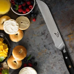 Alpha-Royal Japanese Serie 8" Brotmesser 18° Wellenschliff Damaszener-Stahl -Outdoor Grills Verkaufsgeschäft 10038985 de 0004 logo