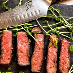 Alpha-Royal Japanese Serie 7" Santoku-Messer Damaszener-Stahl 11 Alpha-Royal Japanese Serie 7" Santoku-Messer Damaszener-Stahl -Outdoor Grills Verkaufsgeschäft 10038996 de 0005 logo