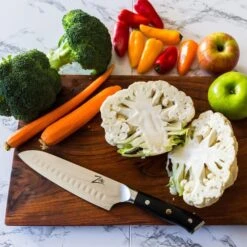 Alpha-Royal Japanese Serie 7" Santoku-Messer Damaszener-Stahl 12 Alpha-Royal Japanese Serie 7" Santoku-Messer Damaszener-Stahl -Outdoor Grills Verkaufsgeschäft 10038996 de 0006 logo