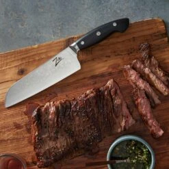 Executive-Plus Serie 7" Santokumesser 61 HRC Damaszenerstahl -Outdoor Grills Verkaufsgeschäft 10039011 de 0005 logo