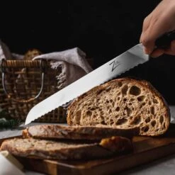 Comfort Pro Serie 10" Brotmesser 56 HRC Wellenschliff -Outdoor Grills Verkaufsgeschäft 10039022 yy 0004 logo